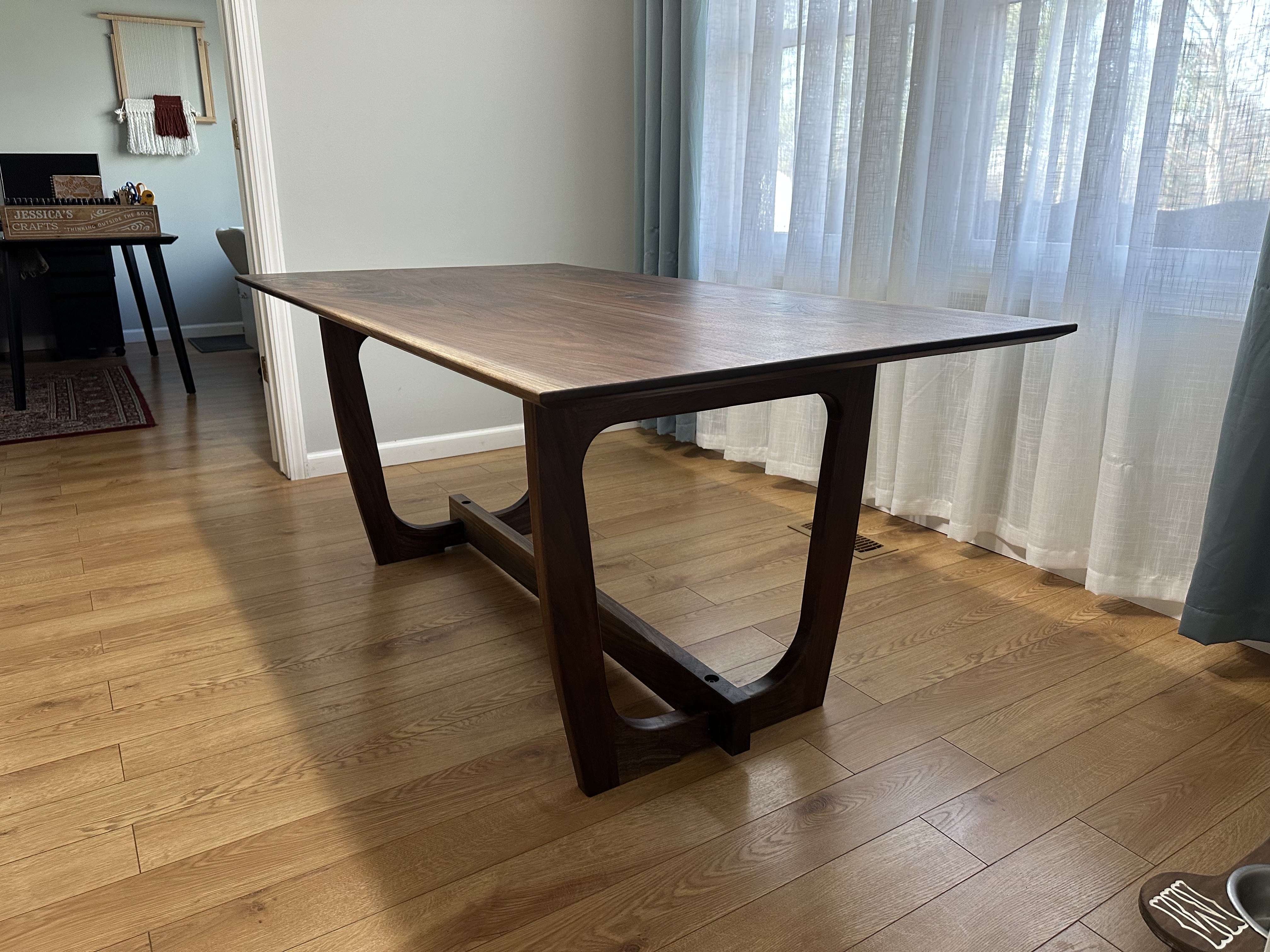 Custom walnut dining table in a Milwaukee-area home